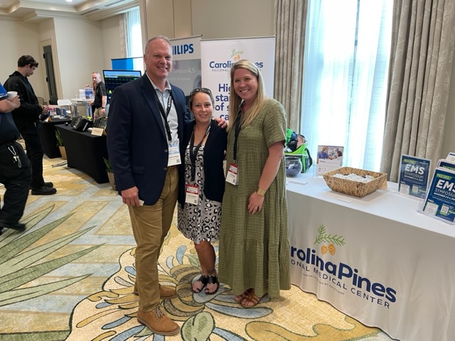 Thornton with Edie Campbell and Erin Griggs from Carolina Pines, sponsor of an upcoming EMS Symposium