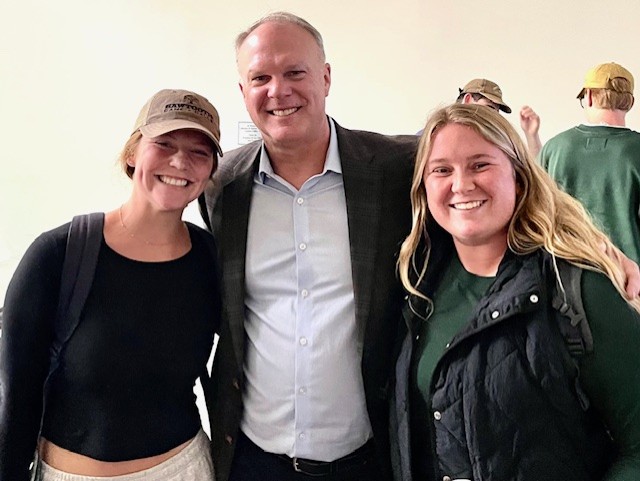 Thornton Kirby with two of his daughter's sorority sisters at Wofford